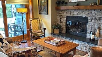 Smart TV, fireplace, books