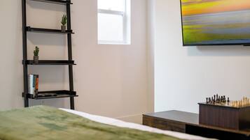 2 bedrooms, desk, iron/ironing board, travel crib