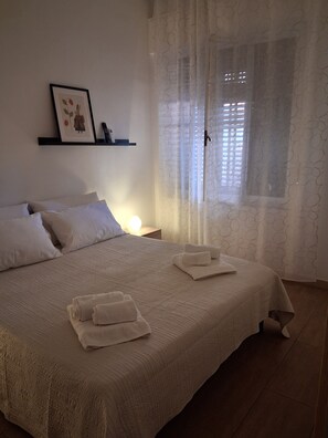 2 dormitorios, escritorio, tabla de planchar con plancha y wifi gratis
