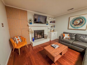 TV, fireplace - Chic & Bright Home in North Hills & Close to Downtown (Raleigh)