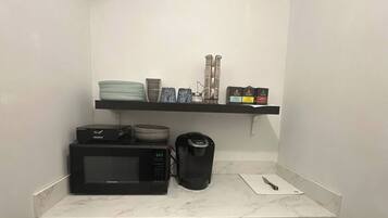 Fridge, microwave, coffee/tea maker, toaster