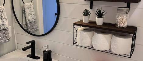 Hair dryer, towels, soap, shampoo