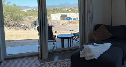 Serene, modern & fully furnished 1 bedroom apartment with desert mountain views