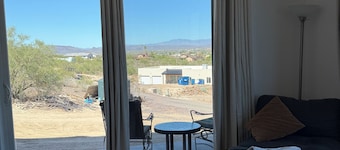 Serene, modern & fully furnished 1 bedroom apartment with desert mountain views