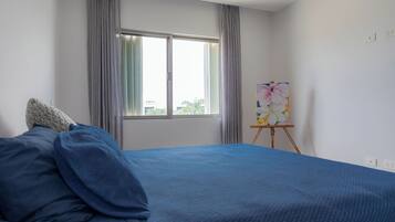 Family Apartment, Pool View | In-room safe, iron/ironing board, free WiFi