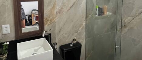 Shower, towels, soap, toilet paper