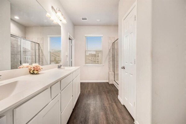 Shower, hair dryer, towels, soap