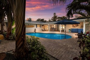 A heated pool - Tropical Tiki:Outdoor Oasis, Tiki Hut, Pool by Anna Maria Life Vacation Rentals (Bradenton)