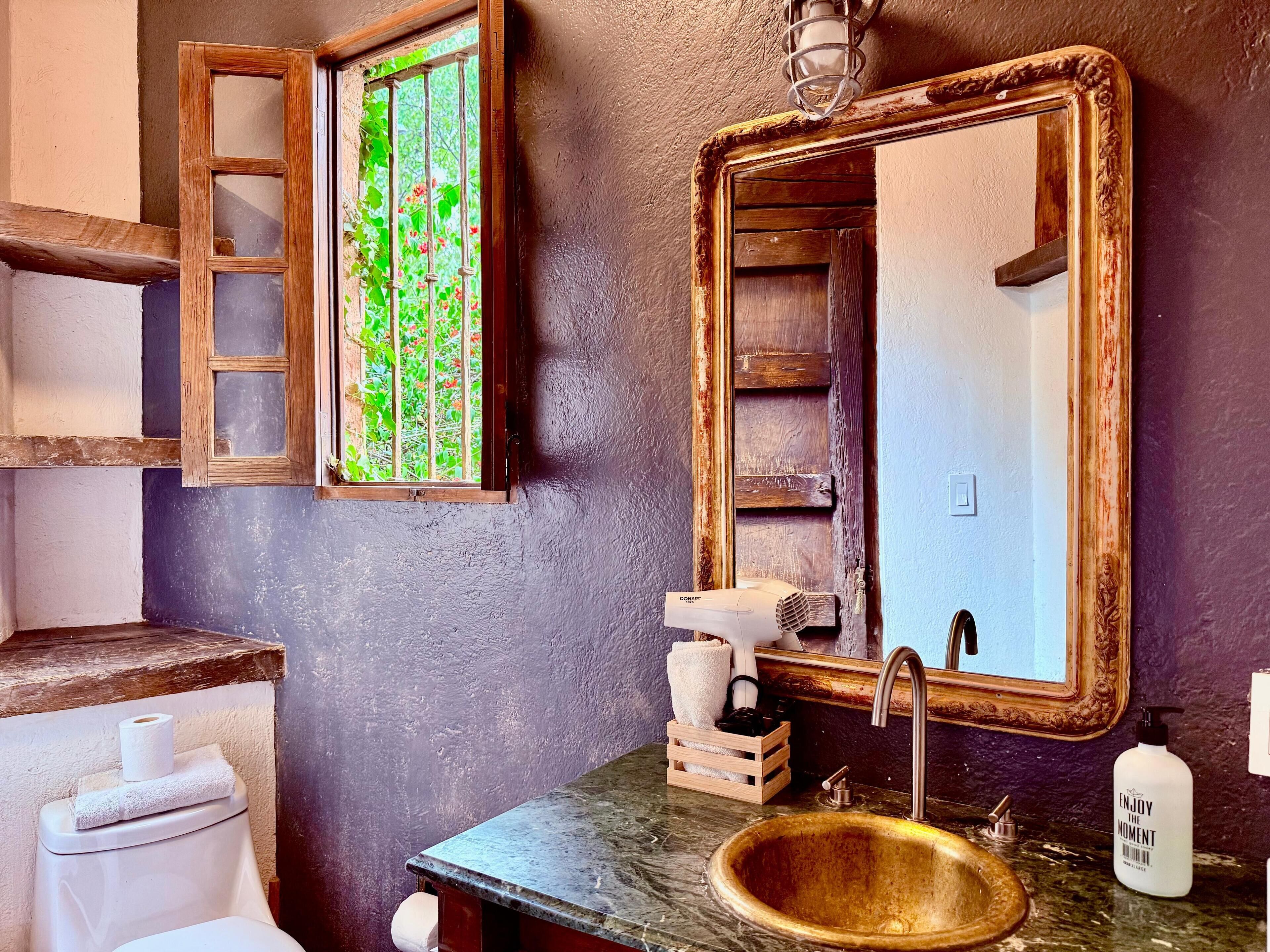 Hair dryer, towels, soap, toilet paper