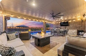 TV, fireplace - Theater Waterfront Heated Pool Smart Home (Cypress)