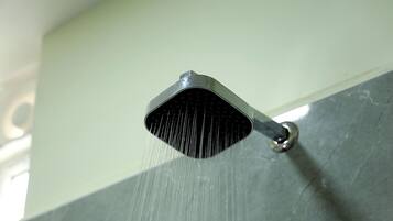 Shower, towels, soap, shampoo