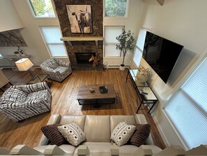 Smart TV, fireplace, books