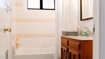 Hair dryer, towels, soap, shampoo