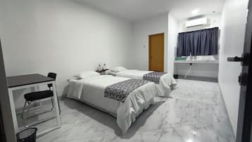 Deluxe Double or Twin Room | Individually furnished, desk, laptop workspace