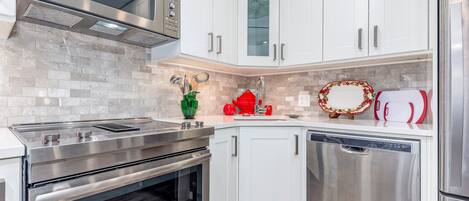 Microwave, stovetop, dishwasher, coffee/tea maker