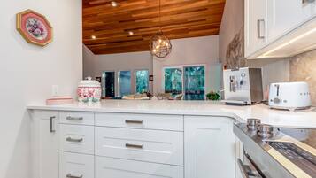 Microwave, stovetop, dishwasher, coffee/tea maker