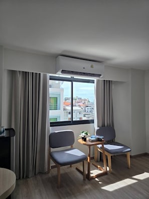 Deluxe Double Room | Laptop workspace, blackout drapes, free WiFi