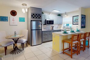 Fridge, microwave, coffee/tea maker - Copa Palms – Canal-Front 1BR with Heated Pool, Dock Access & 5-Min Walk to Treasure Island Beach. (Treasure Island)