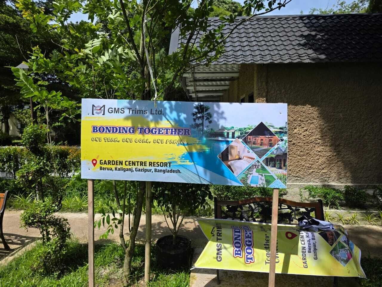 A signboard for Garden Centre Resort in Berua, Kaliganj, Gazipur, Bangladesh, with a logo and a map.