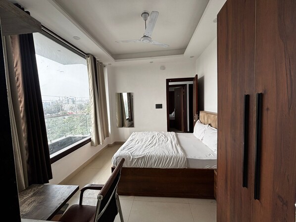 Desk, laptop workspace, free WiFi, bed sheets