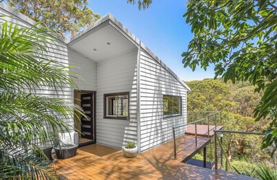 Large architect designed home directly overlooking the Royal National Park