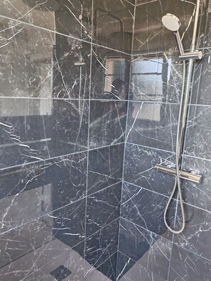 Shower, hair dryer, towels, soap