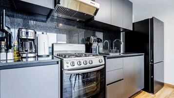 Fridge, microwave, stovetop, coffee/tea maker