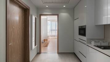 Fridge, microwave, stovetop, cookware/dishes/utensils