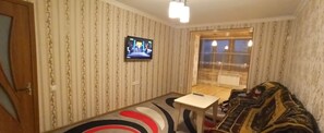 Comfort-Apartment, Balkon, Stadtblick | Wohnzimmer