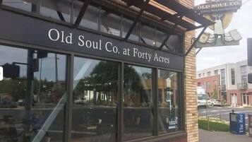 A storefront with a sign reading "Old Soul Co. at Forty Acres."