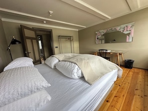 1 bedroom, travel cot, bed sheets - Gamla Apótekið (The Old Pharmacy)  in heart of Akureyri - South Apartment (Akureyri)