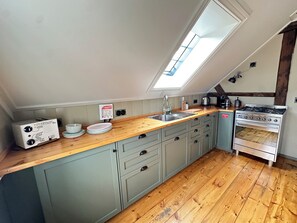 Fridge, oven, stovetop, dishwasher - Gamla Apótekið (The Old Pharmacy)  in heart of Akureyri - South Apartment (Akureyri)