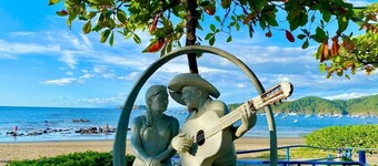 House of the Orange Cat: Enjoy an unforgettable stay at this three-bedroom, two-bath villa featuring a private gated parking area and a private patio with its own pool.