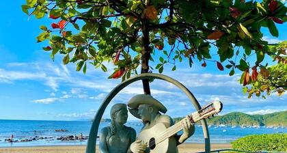 House of the Orange Cat: Enjoy an unforgettable stay at this three-bedroom, two-bath villa featuring a private gated parking area and a private patio with its own pool.