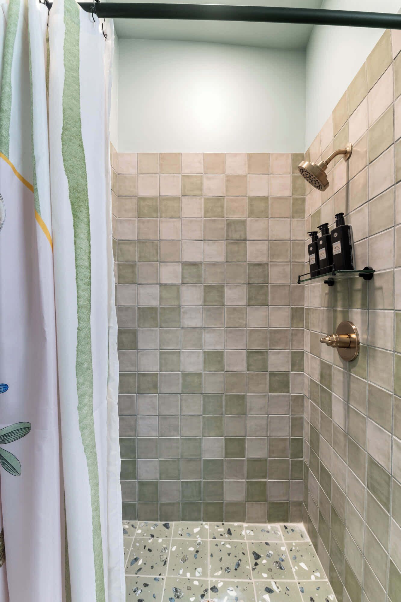 Shower, hair dryer, towels, shampoo