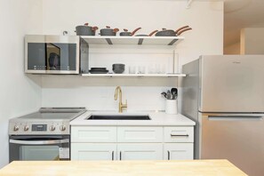 Fridge, microwave, oven, stovetop - Sol – Bright & Cheerful Bachelor Suite in NULU (Louisville)