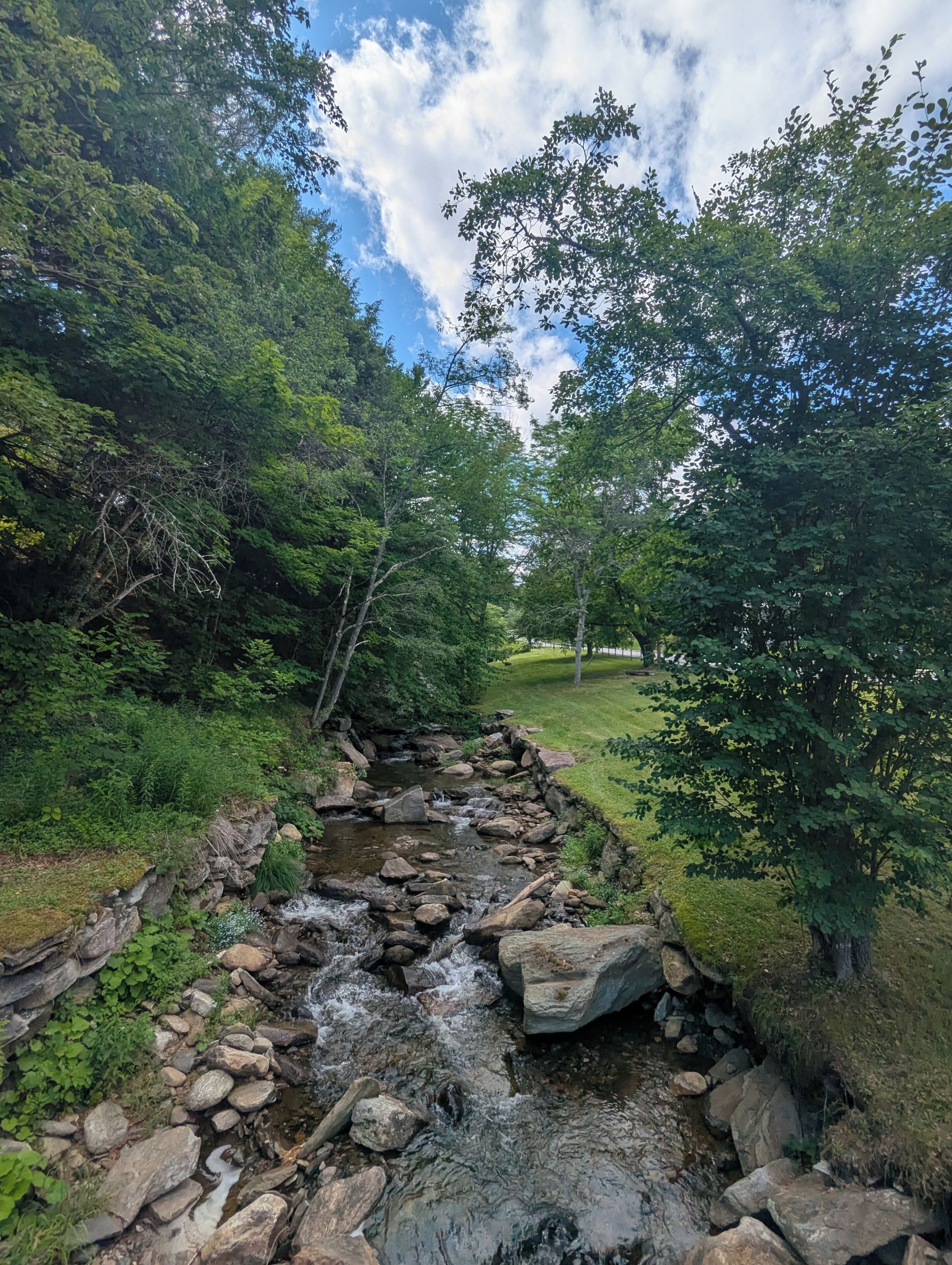 enjoy a waterfall and brook just around the corner