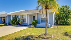 A two-story building with a flat roof and a front porch. - Pool Access: Condo 4 Mi to Bradenton Riverwalk! (Bradenton)
