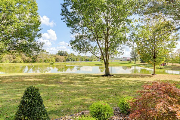 A serene park with a pond, trees, and a well-maintained lawn. - Fish, Unplug & Unwind! Countryside Plymouth Home (Plymouth)