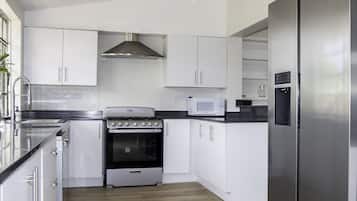 Villa, 4 Bedrooms | Private kitchen | Fridge, oven, coffee/tea maker, toaster