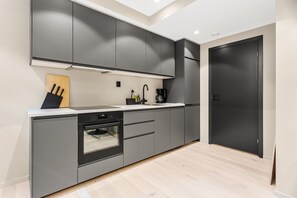 Fridge, microwave, oven, stovetop - Heimby apartments | Brand New apartment in Bergen (Bergen)
