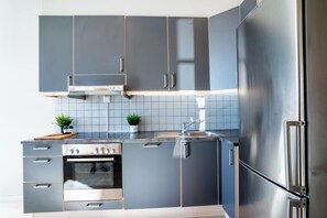 Réfrigérateur, four, plaque de cuisson, lave-vaisselle