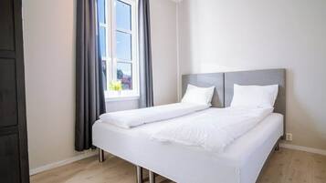 2 dormitorios, tabla de planchar con plancha, cuna de viaje y wifi