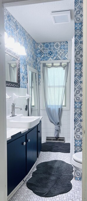 Hair dryer, towels, soap, shampoo