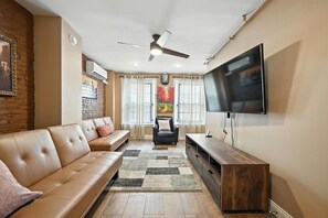 TV, fireplace, books, offices