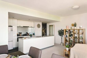 Coffee/tea maker, fridge, microwave, oven
