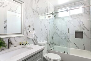 Shower, hair dryer, towels