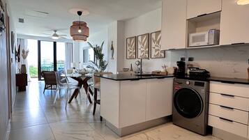 Coffee/tea maker, fridge, microwave, oven