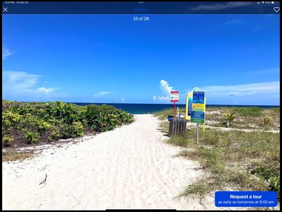 Ocean-Beach Front condo with pool-gym-sauna. Short walk to shops, eats and bars.