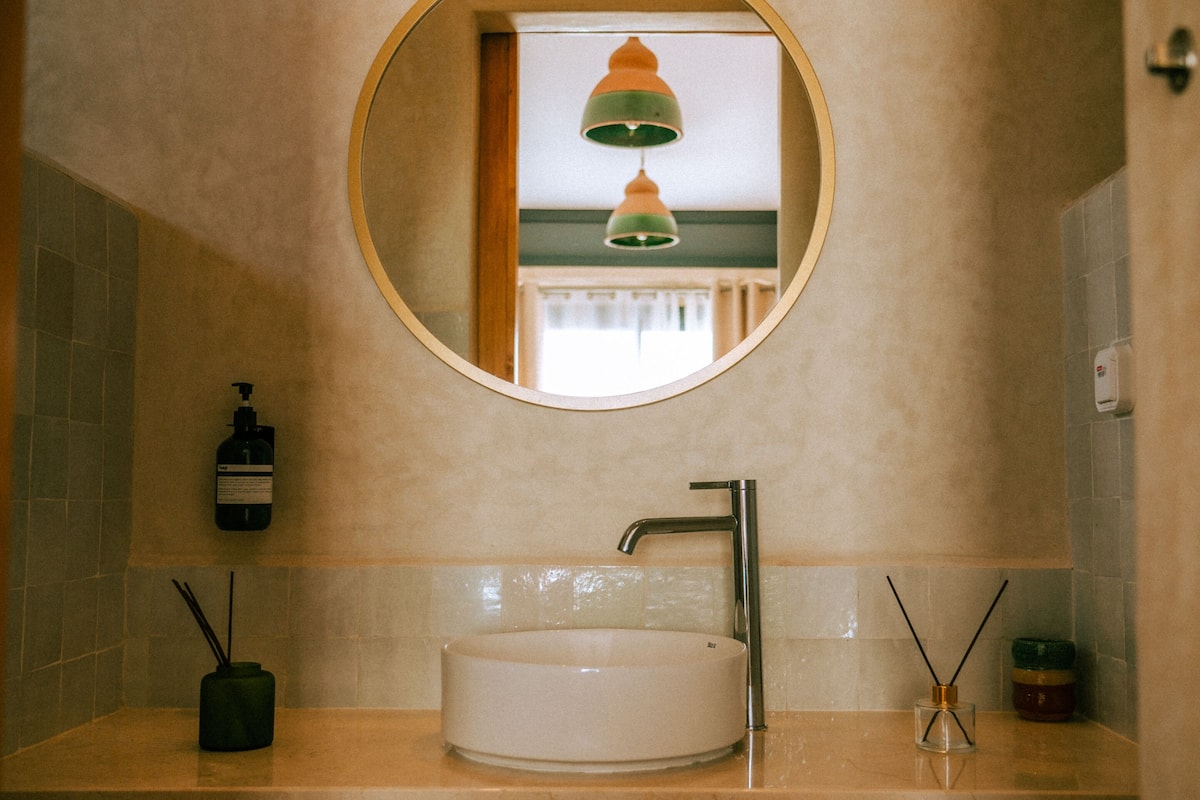 Bathtub, hair dryer, towels, soap